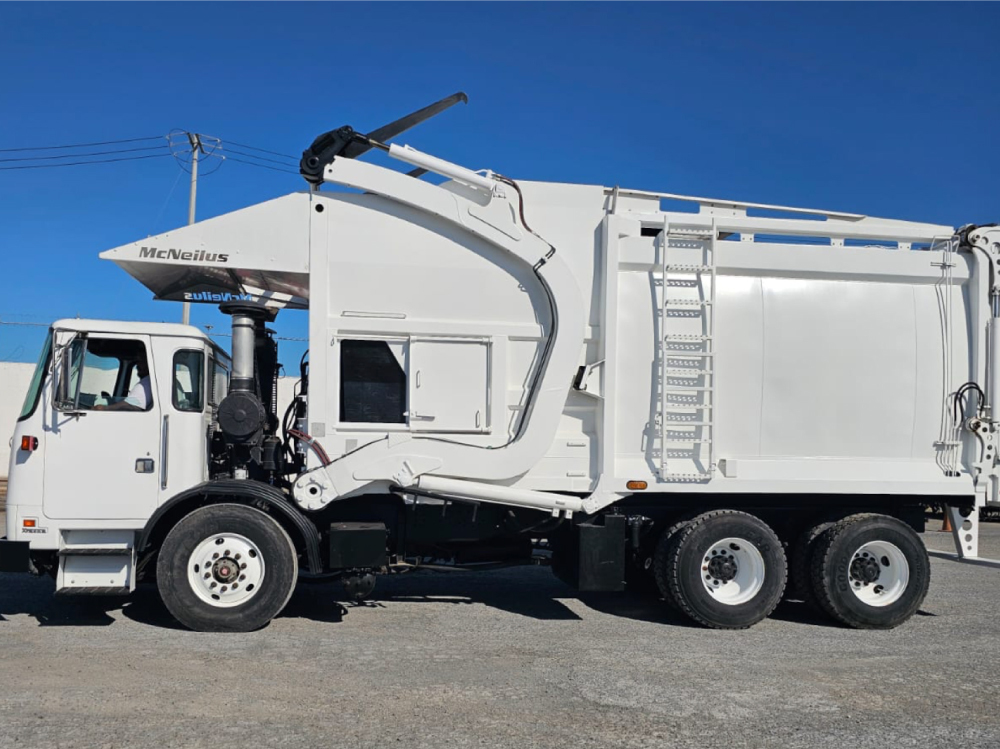 autocar-2010-body-macneilus-30-yds-front-loader-garbage-trucks-mte-15