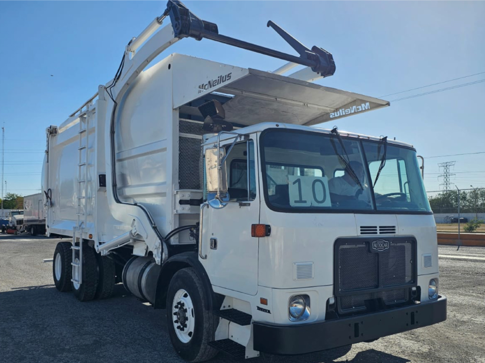 autocar-2010-body-macneilus-30-yds-front-loader-garbage-trucks-mte-18
